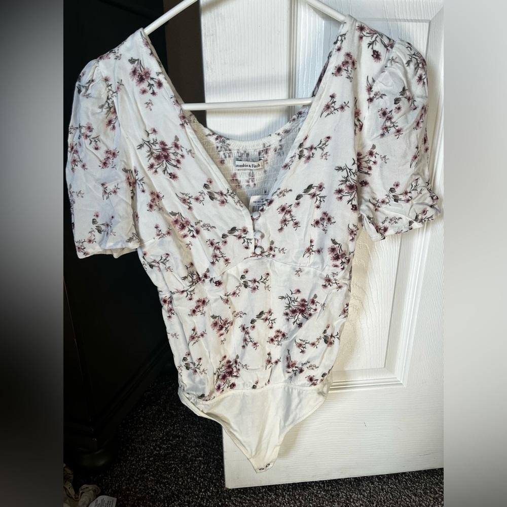 Abercrombie floral body suit. Size xs